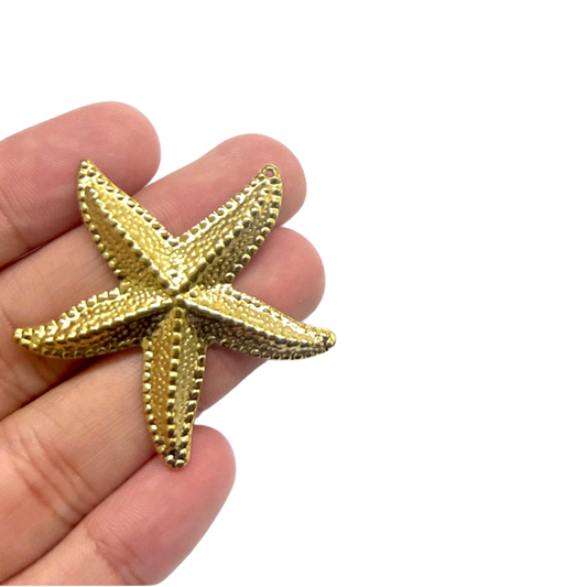 Charm estrella de mar - dorado