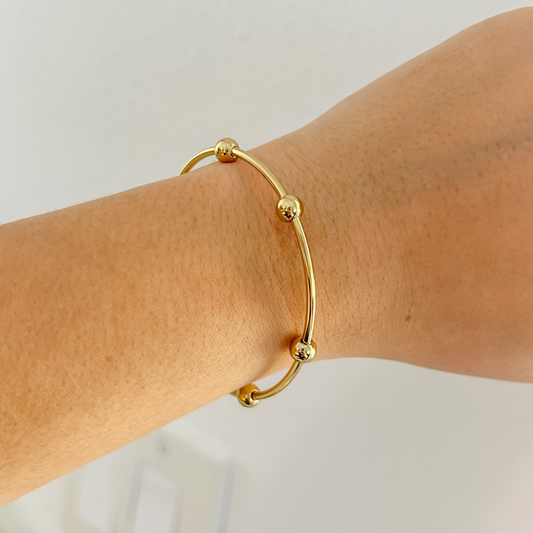Pulsera bolitas - ajustable - dorado