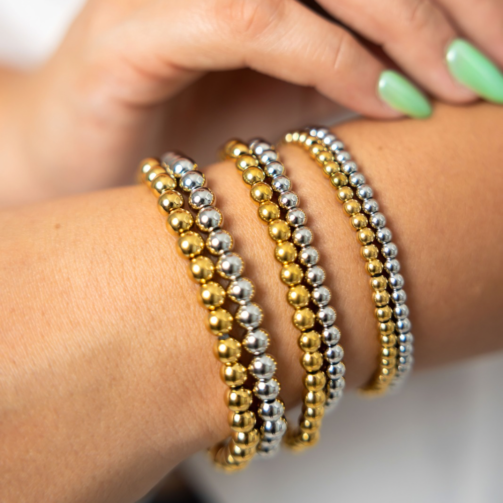 Pulseras elásticas - bolitas - plata