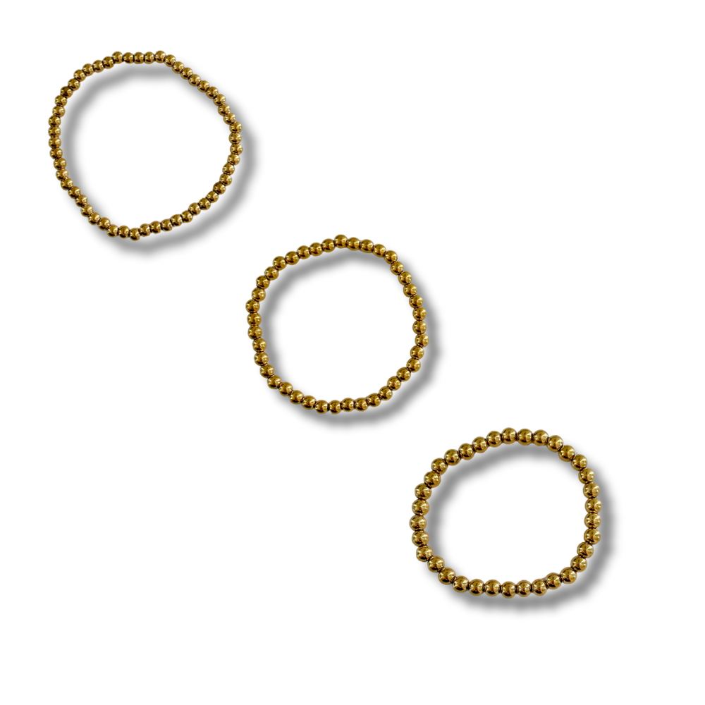 Pulseras bolitas - elásticas - dorado