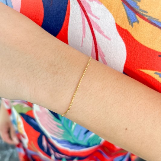 Pulsera bolitas - dorado