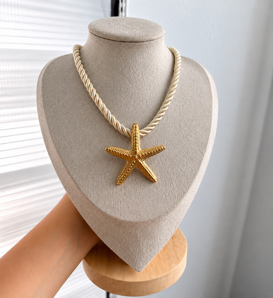 Collar trenzado - estrella de mar, caracol, sol - dorado