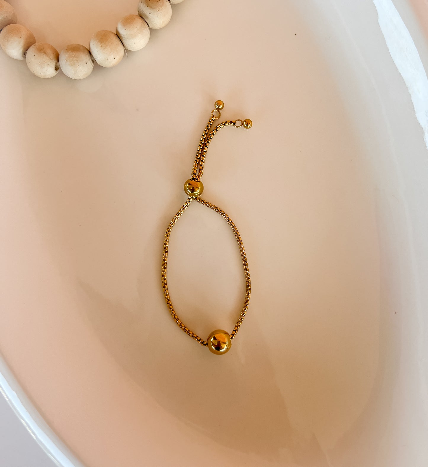 Pulsera bolita - ajustable - dorado