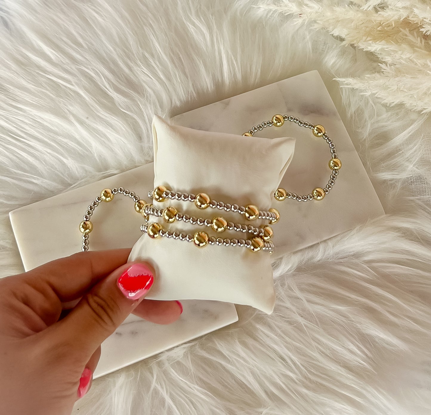 Pulsera Belle - ajustable - dorado o dos tonos - elástica - bolitas