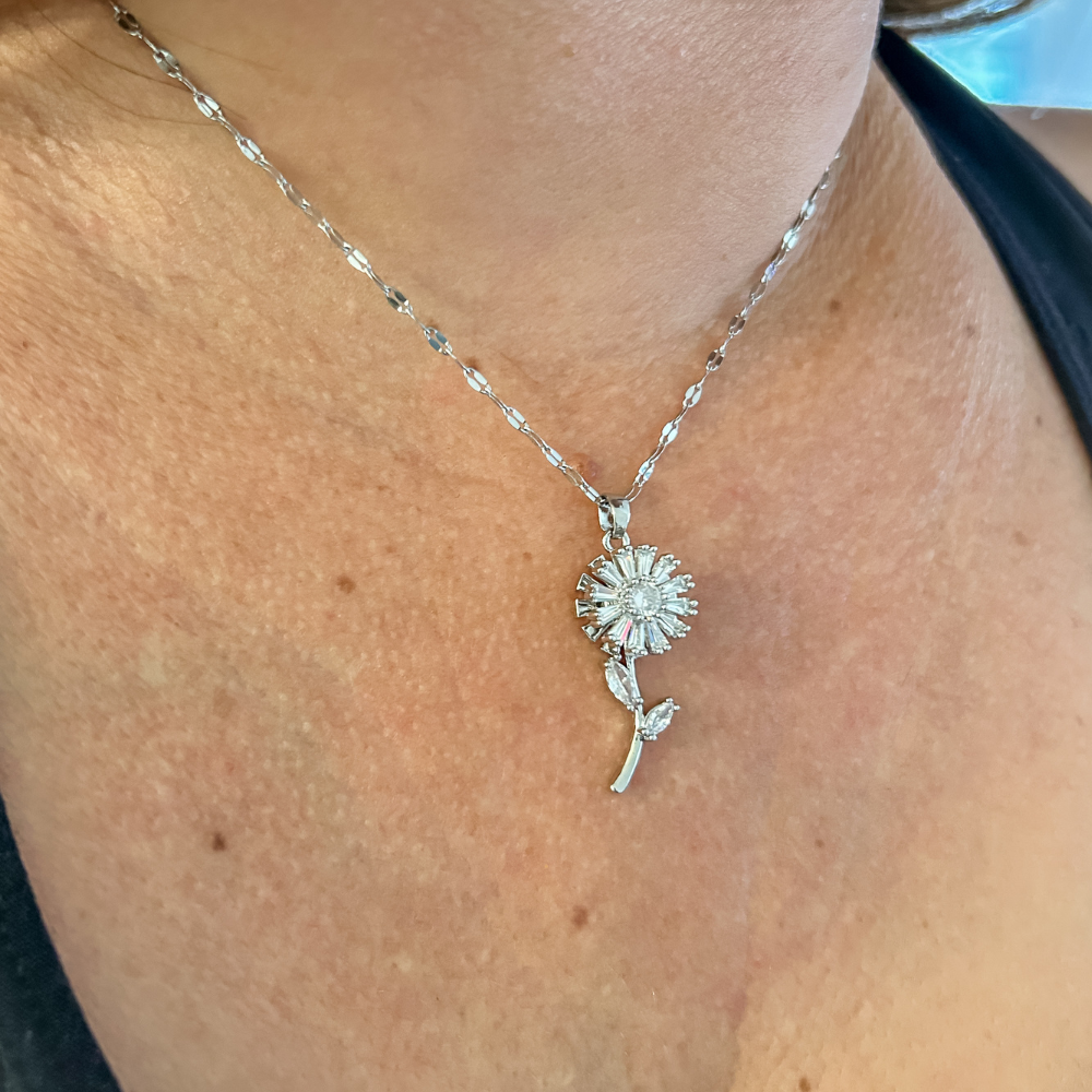 Collar flor giratoria - plata